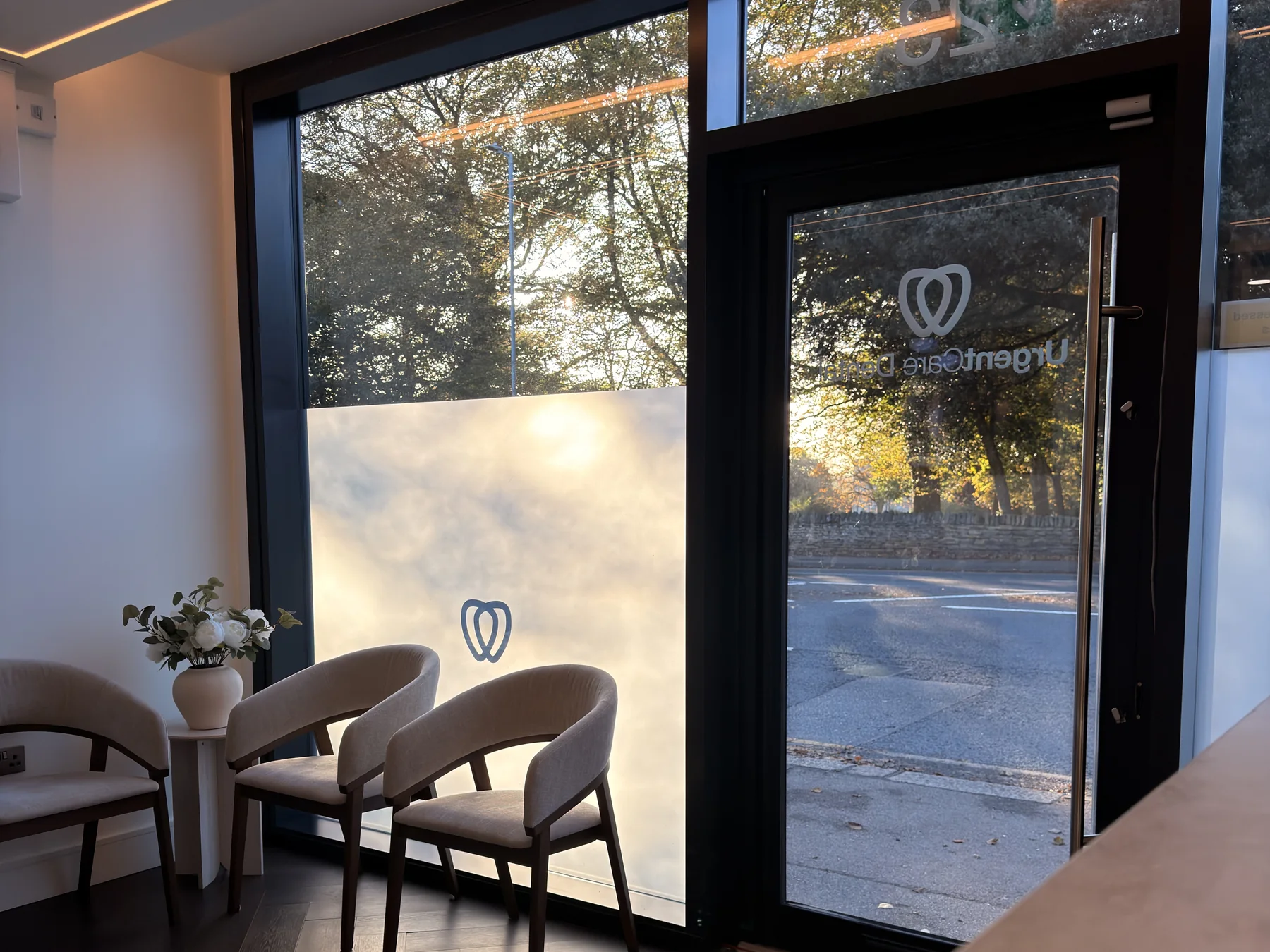 The waiting area at UrgentCare Dental Northampton, with Harborough Road outside the window