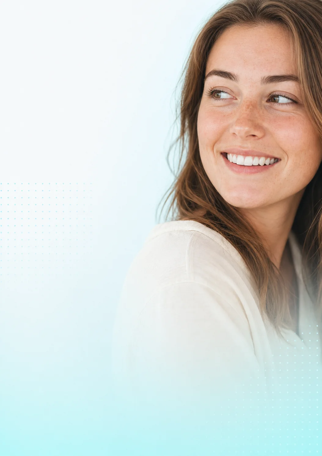 A woman smiling with clean, bright teeth